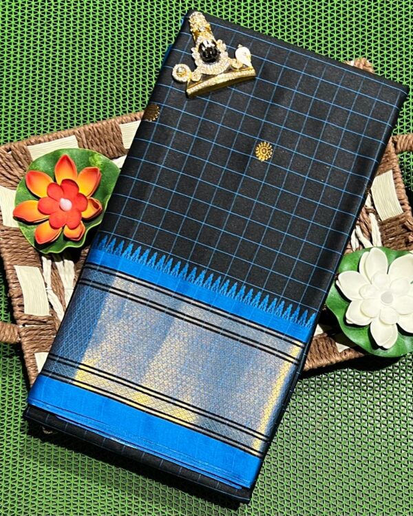 A luxurious Kanjivaram silk saree with intricate checks and butta designs in vibrant colors