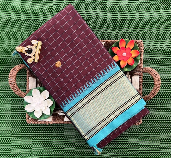 A luxurious Kanjivaram silk saree with intricate checks and butta designs in vibrant colors