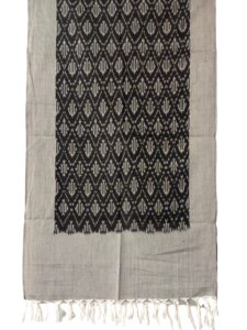 "Handwoven mercerized cotton stole with geometric Pochampally Ikat design spread out flat."