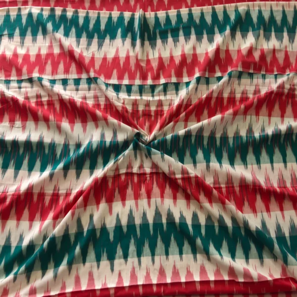 Pochampally ikat design cotton fabric in vibrant colors, handwoven by Pavankumarweaves. 45 inches wide, ideal for dresses, shirts, and home decor