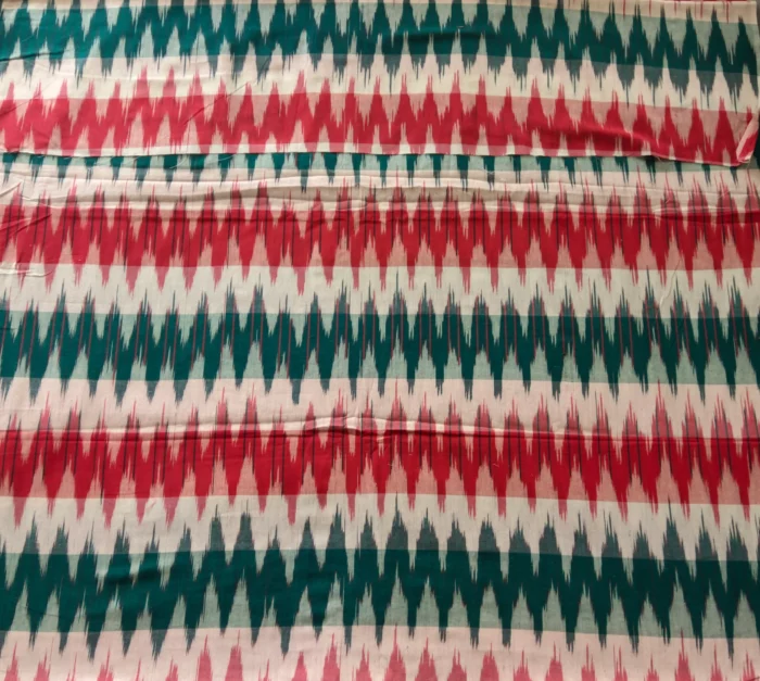 Pochampally ikat design cotton fabric in vibrant colors, handwoven by Pavankumarweaves. 45 inches wide, ideal for dresses, shirts, and home decor.