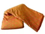 cotton silk fabric with intricate Pochampalli design and vibrant colors"