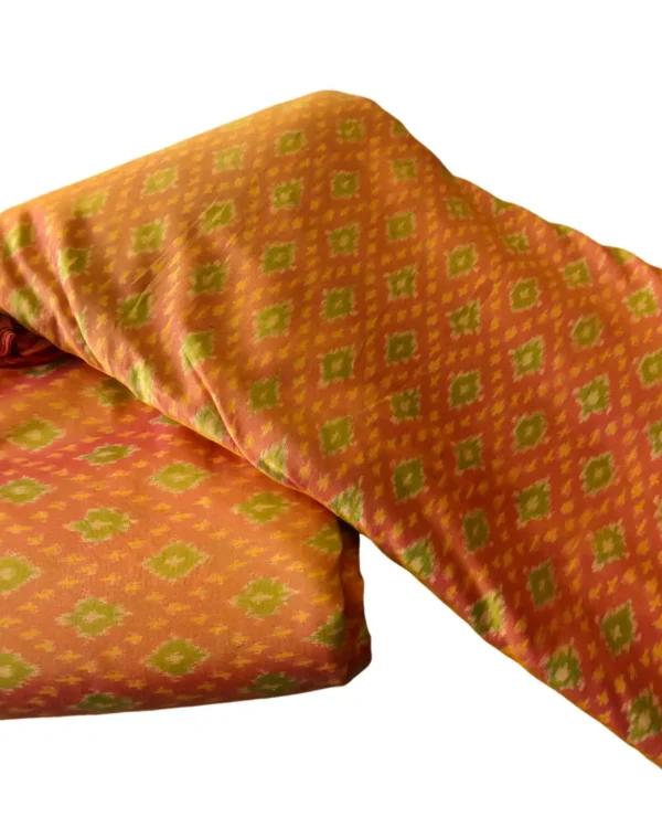 cotton silk fabric with intricate Pochampalli design and vibrant colors"