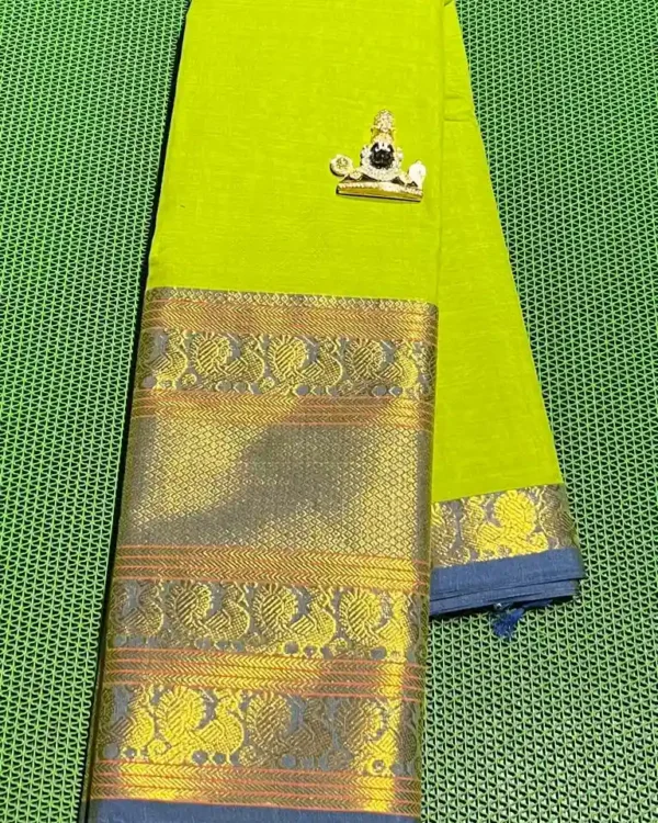 Handwoven Narayanpet cotton saree featuring a bright green base, a contrasting blue border, and gold zari accents