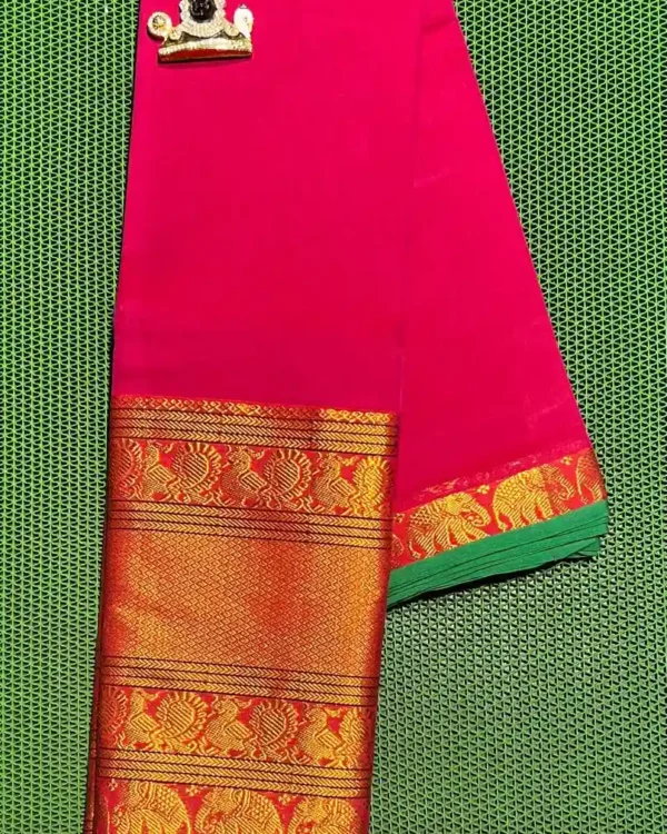 Narayanpet cotton saree in pink with a green border and gold elephant motifs