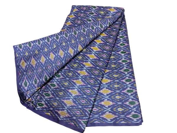 cotton silk fabric with a traditional ikat pattern featuring multicolored diamond motifs arranged in a symmetrical design."