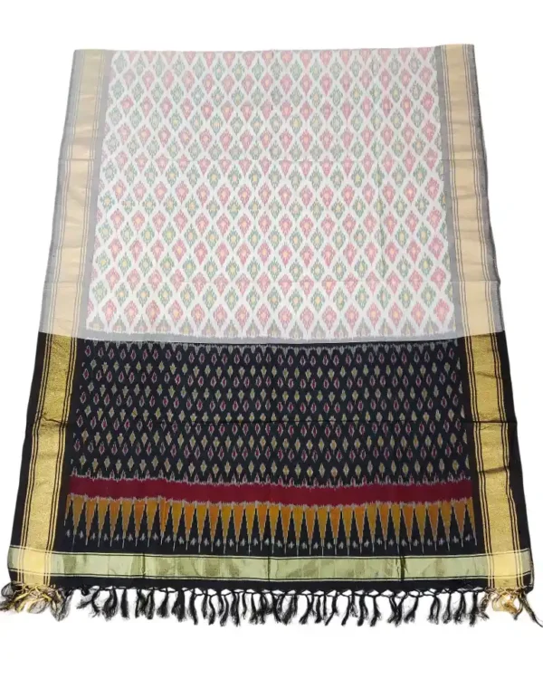 Pochampally Ikat COTTON silk suit with intricate handloom weaving patterns, showcasing traditional geometric designs, bordered with rich detailing.
