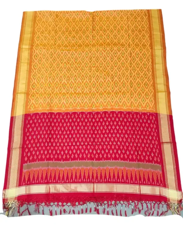 Pochampally Ikat COTTON silk suit with intricate handloom weaving patterns, showcasing traditional geometric designs, bordered with rich detailing.