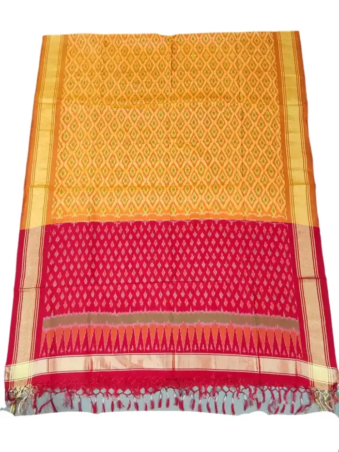 Pochampally Ikat COTTON silk suit with intricate handloom weaving patterns, showcasing traditional geometric designs, bordered with rich detailing.