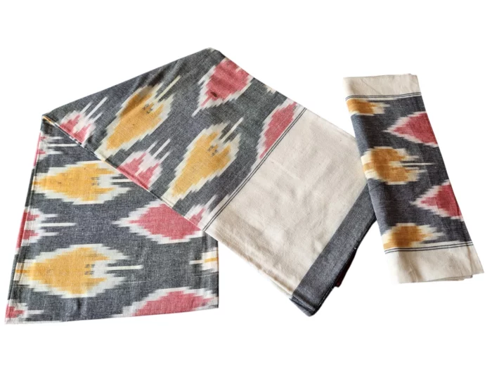 Pochampally handloom bedsheet with vibrant geometric patterns, crafted for a single cot, size 9x7 feet