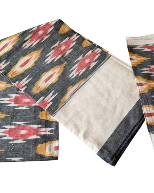 Traditional Pochampally single cot bedsheet, featuring intricate ikat designs in bright, bold colors