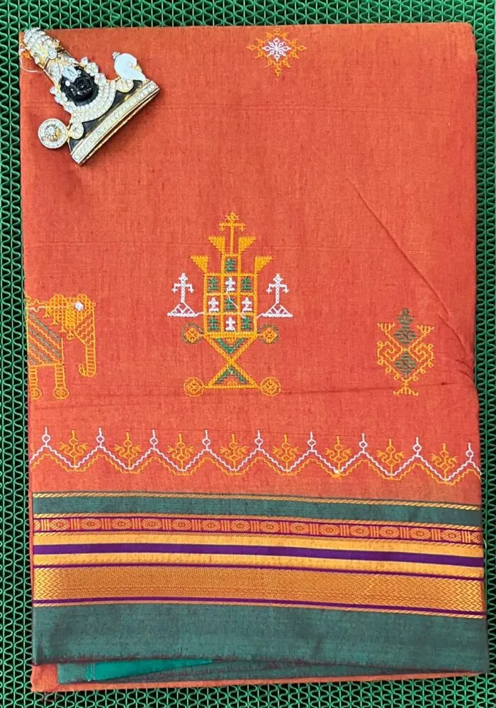 Designer Kasuti saree with geometric patterns and matching blouse piece
