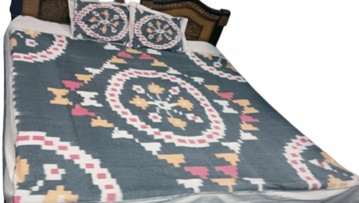 Luxurious handloom bedsheet in pure cotton, king size 9x7 feet, with matching pillow covers, showcasing intricate handwoven patterns