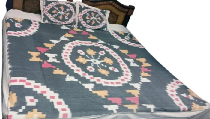 Luxurious handloom bedsheet in pure cotton, king size 9x7 feet, with matching pillow covers, showcasing intricate handwoven patterns