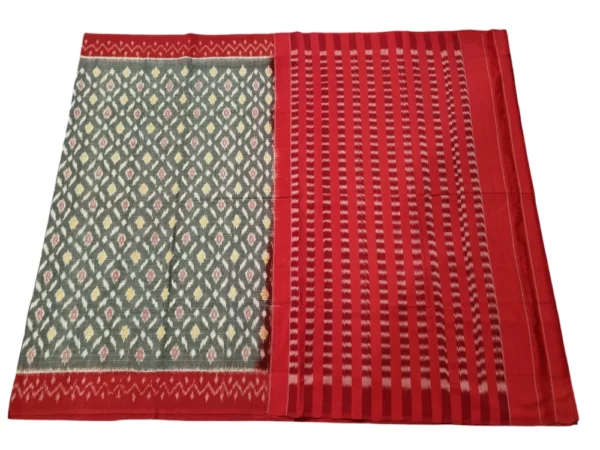 Elegant Pochampally saree with traditional double ikat design, featuring vibrant geometric patterns and a matching blouse piece