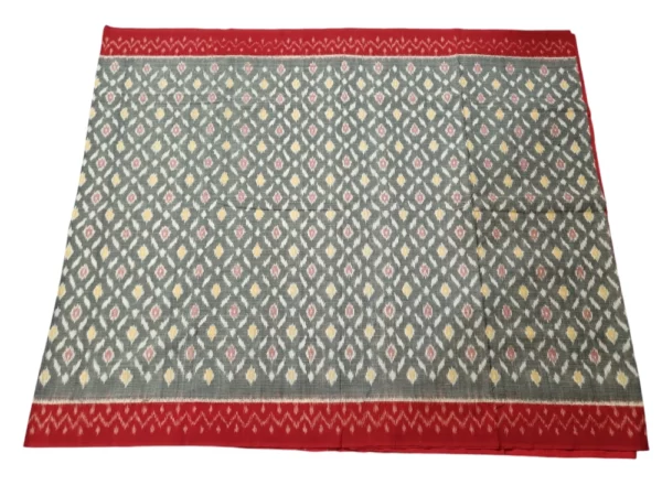 Handwoven Pochampally silk saree in a classic ikat pattern, showcasing intricate craftsmanship and rich cultural heritage