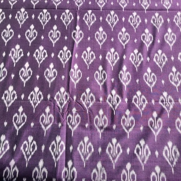 Traditional ikat fabric in red and black checks, a timeless choice for sarees and shirts