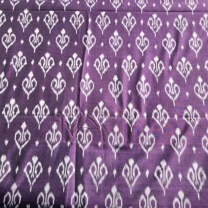 Traditional ikat fabric in red and black checks, a timeless choice for sarees and shirts