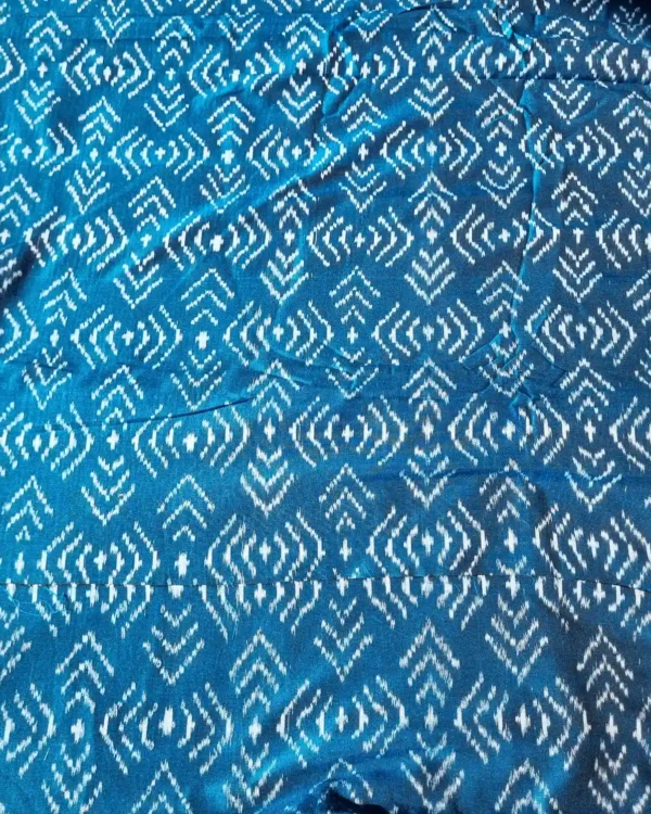 Elegant ikat fabric with bold zigzag patterns in black and beige