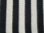 Handwoven double ikat fabric in vibrant tie-and-dye patterns, 45-inch width