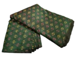 Colorful ikat fabric with symmetrical diamond motifs, crafted from a premium cotton-silk blend, perfect for dresses and upholstery