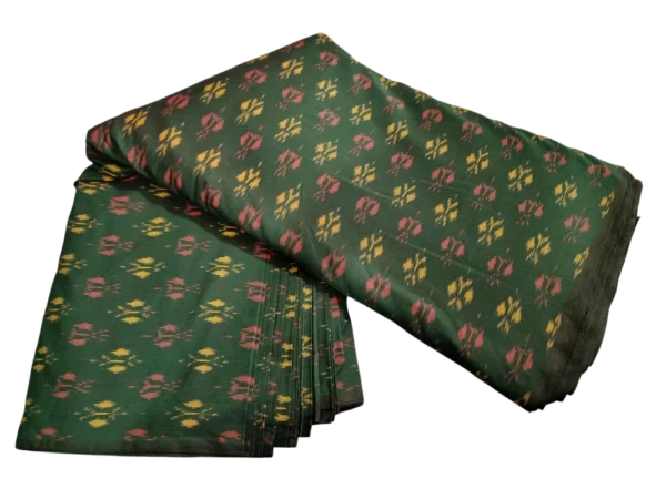 Colorful ikat fabric with symmetrical diamond motifs, crafted from a premium cotton-silk blend, perfect for dresses and upholstery