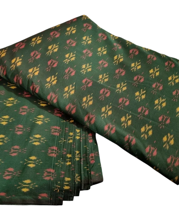 Colorful ikat fabric with symmetrical diamond motifs, crafted from a premium cotton-silk blend, perfect for dresses and upholstery