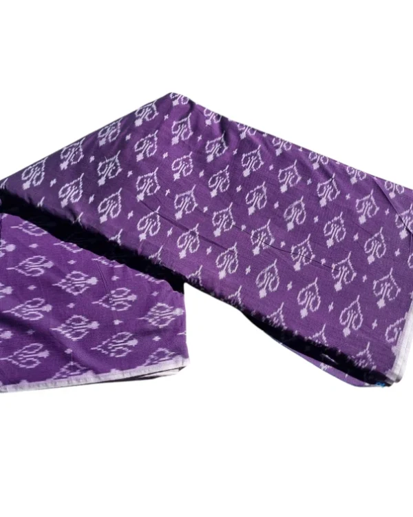 Colorful ikat fabric with vibrant floral-inspired motifs, great for festive wear