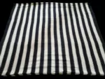 Close-up of premium double ikat fabric, hand-dyed and woven with precision