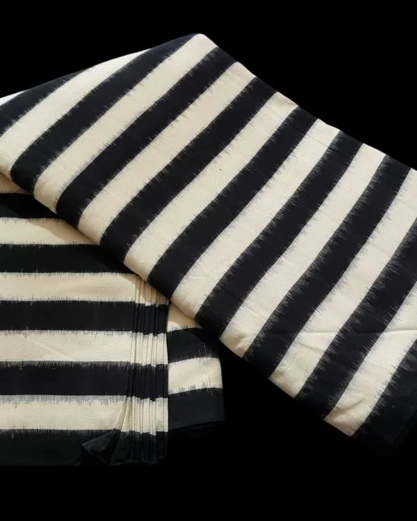 Traditional double ikat fabric showcasing intricate craftsmanship and colorful designs