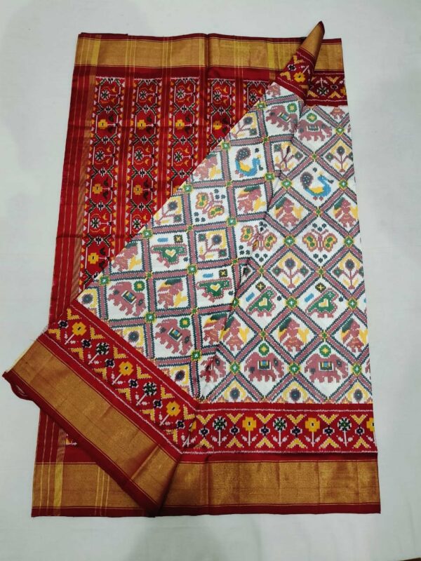 Pochampally Pure Silk Saree featuring traditional double ikat pattern in vibrant colors, handwoven with intricate geometric motifs and a rich pallu