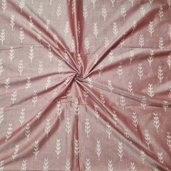 Close-up of vibrant ikat fabric with intricate geometric patterns