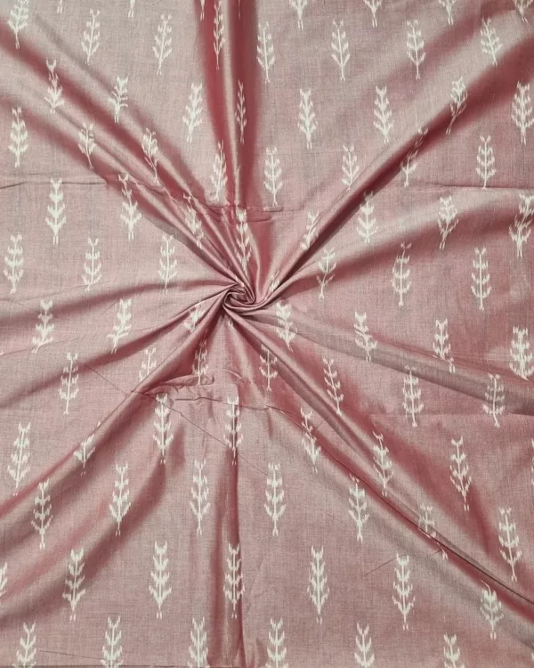 Close-up of vibrant ikat fabric with intricate geometric patterns