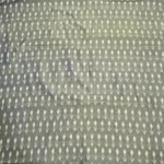 Beautiful ikat fabric with repeating diamond and chevron patterns