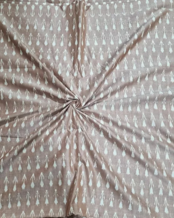 Detailed view of ikat textile with bold zigzag pattern in blue and white