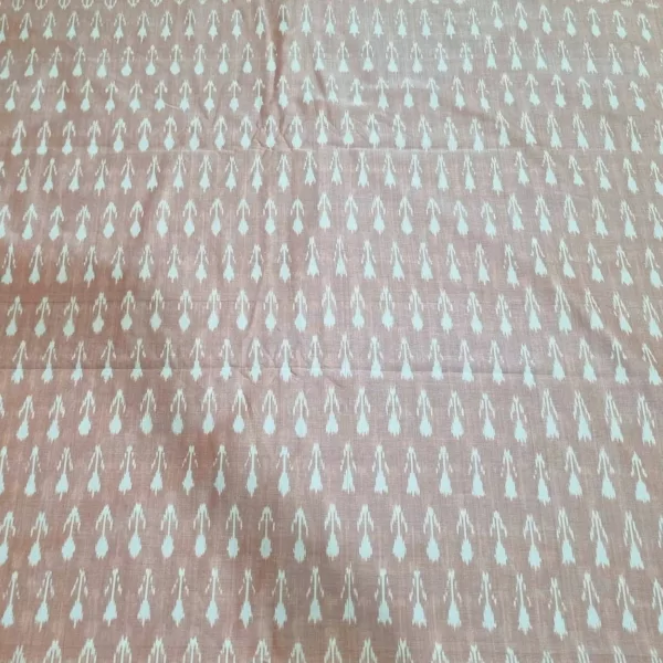 Detailed view of ikat textile with bold zigzag pattern in blue and white