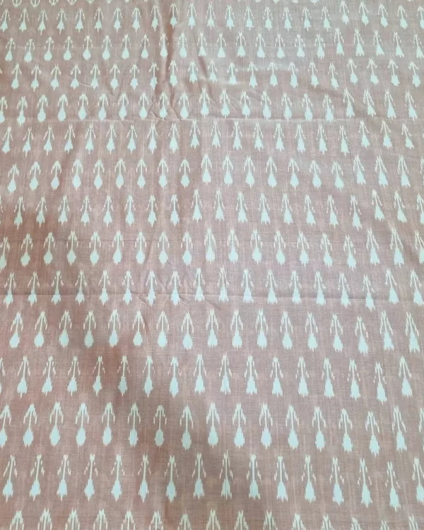 Detailed view of ikat textile with bold zigzag pattern in blue and white