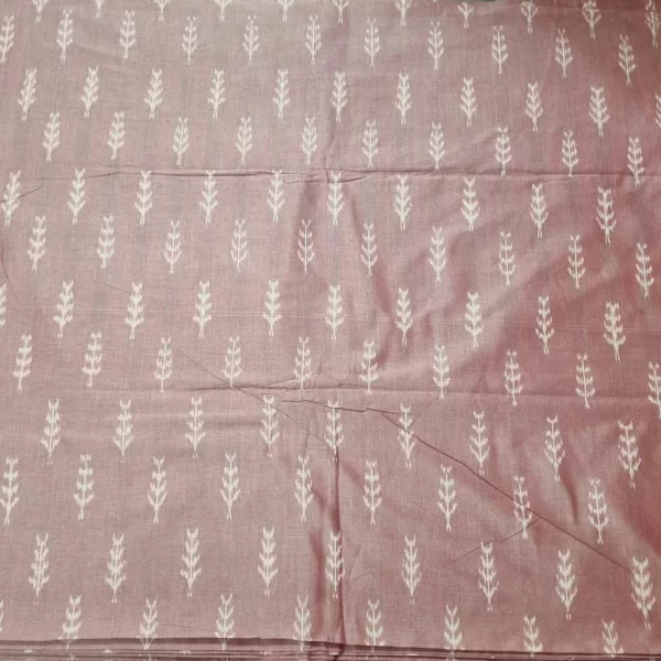 Close-up of vibrant ikat fabric with intricate geometric patterns