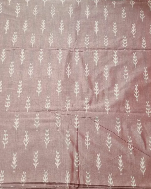 Close-up of vibrant ikat fabric with intricate geometric patterns