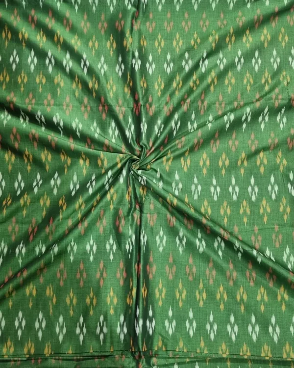 Handwoven ikat fabric with traditional geometric pattern in vibrant colors