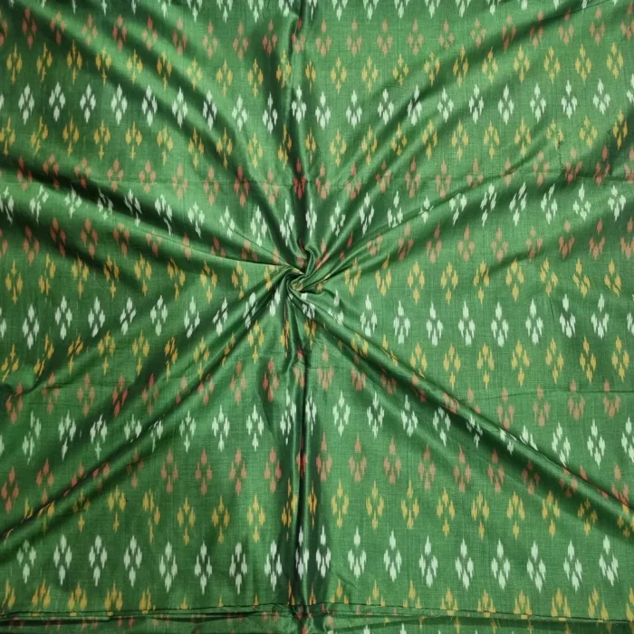 Handwoven ikat fabric with traditional geometric pattern in vibrant colors