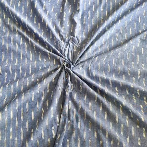 Handwoven ikat cotton fabric in vibrant tie-dye pattern