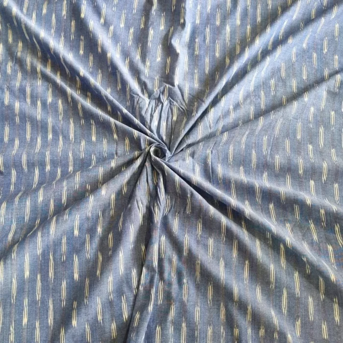 Handwoven ikat cotton fabric in vibrant tie-dye pattern