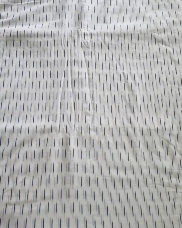 Soft breathable handloom cotton fabric ideal for stitching kurtas, dresses, and shirts – traditional Ikat pattern