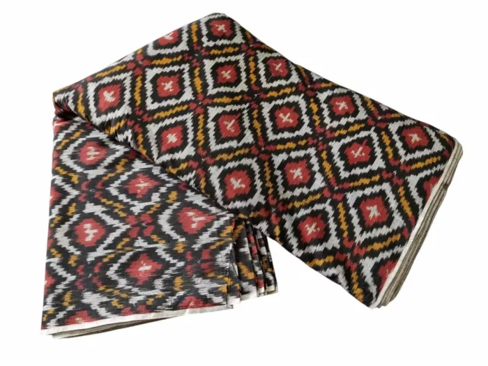 Shop premium handwoven Pochampally ikat fabric featuring a vibrant red, mustard, and white diamond pattern. Ideal for sarees, dupattas, kurtas, and home decor