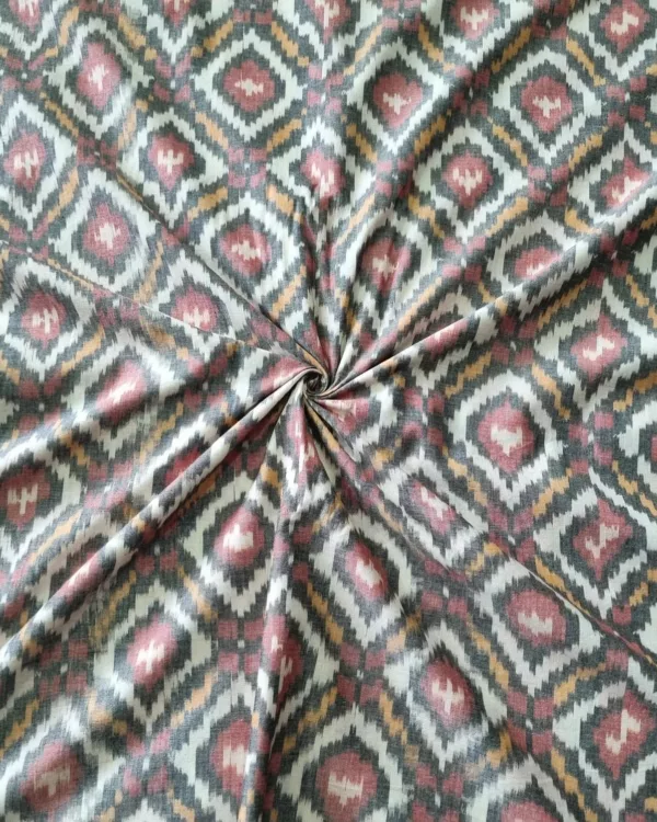 Shop premium handwoven Pochampally ikat fabric featuring a vibrant red, mustard, and white diamond pattern. Ideal for sarees, dupattas, kurtas, and home decor