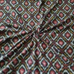 Shop premium handwoven Pochampally ikat fabric featuring a vibrant red, mustard, and white diamond pattern. Ideal for sarees, dupattas, kurtas, and home decor