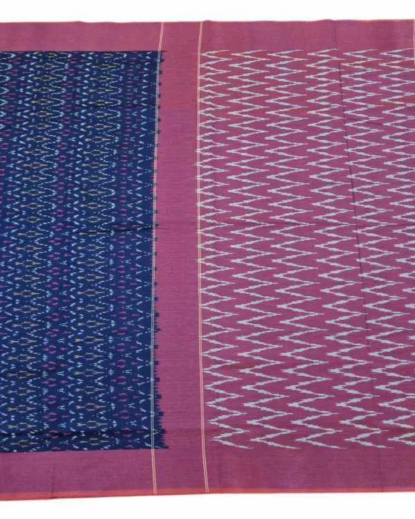 A model wearing a [Main Color] and [Secondary Color] mercerised cotton Pochampally saree with traditional Ikat patterns