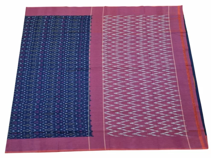 A model wearing a [Main Color] and [Secondary Color] mercerised cotton Pochampally saree with traditional Ikat patterns