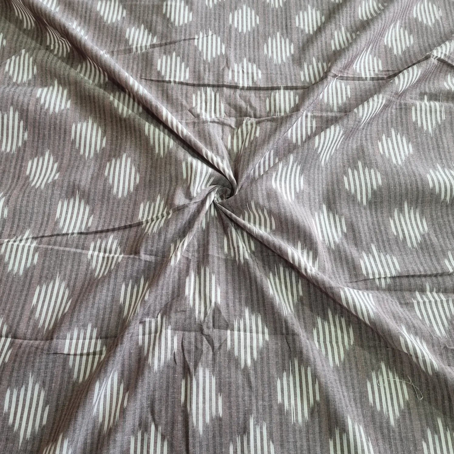 2025/09/1000377509.jpg Pure Cotton Fabric – Handwoven Ikat Design - Image 1